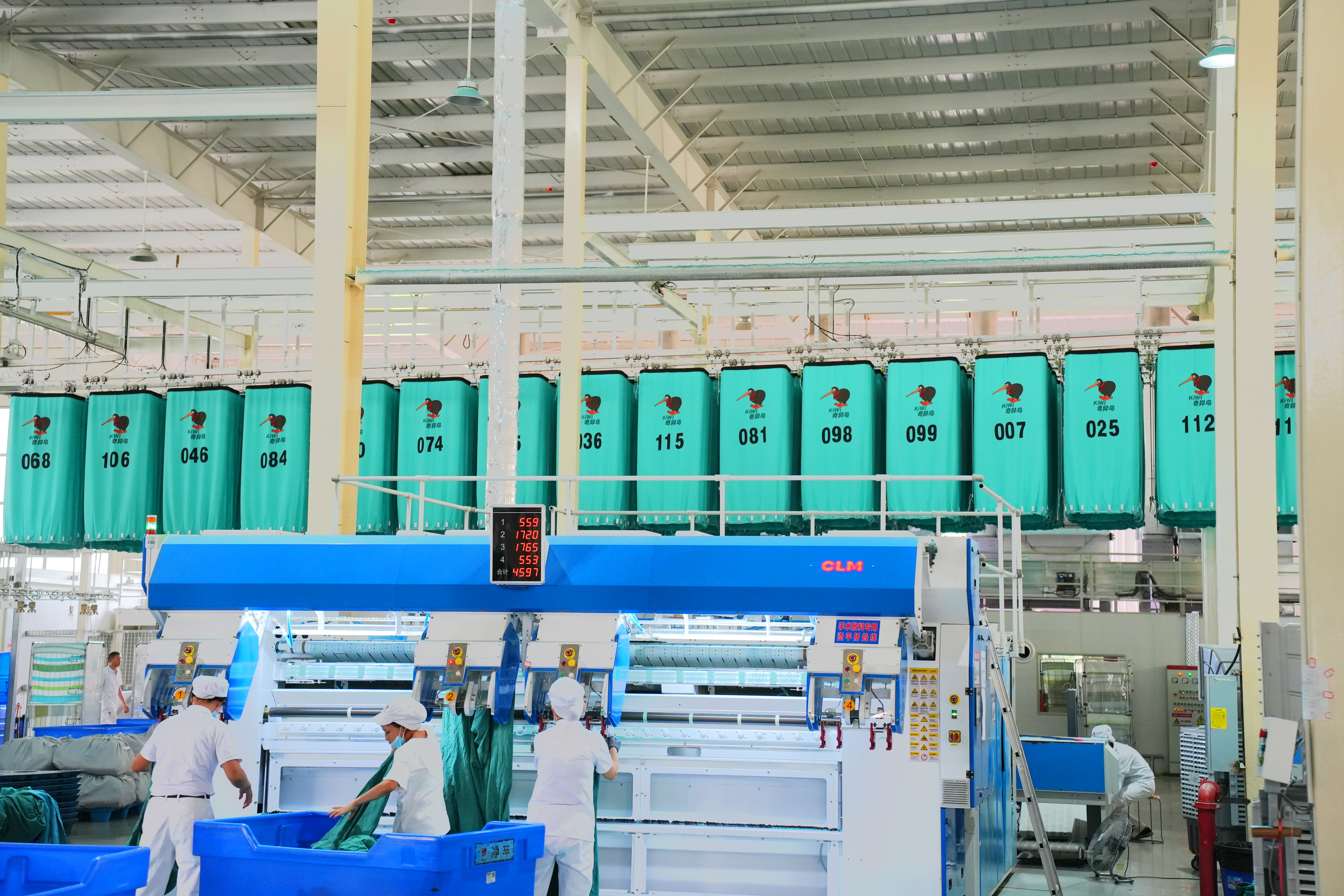 Material Handling Systems in Commercial Laundry Facilities
