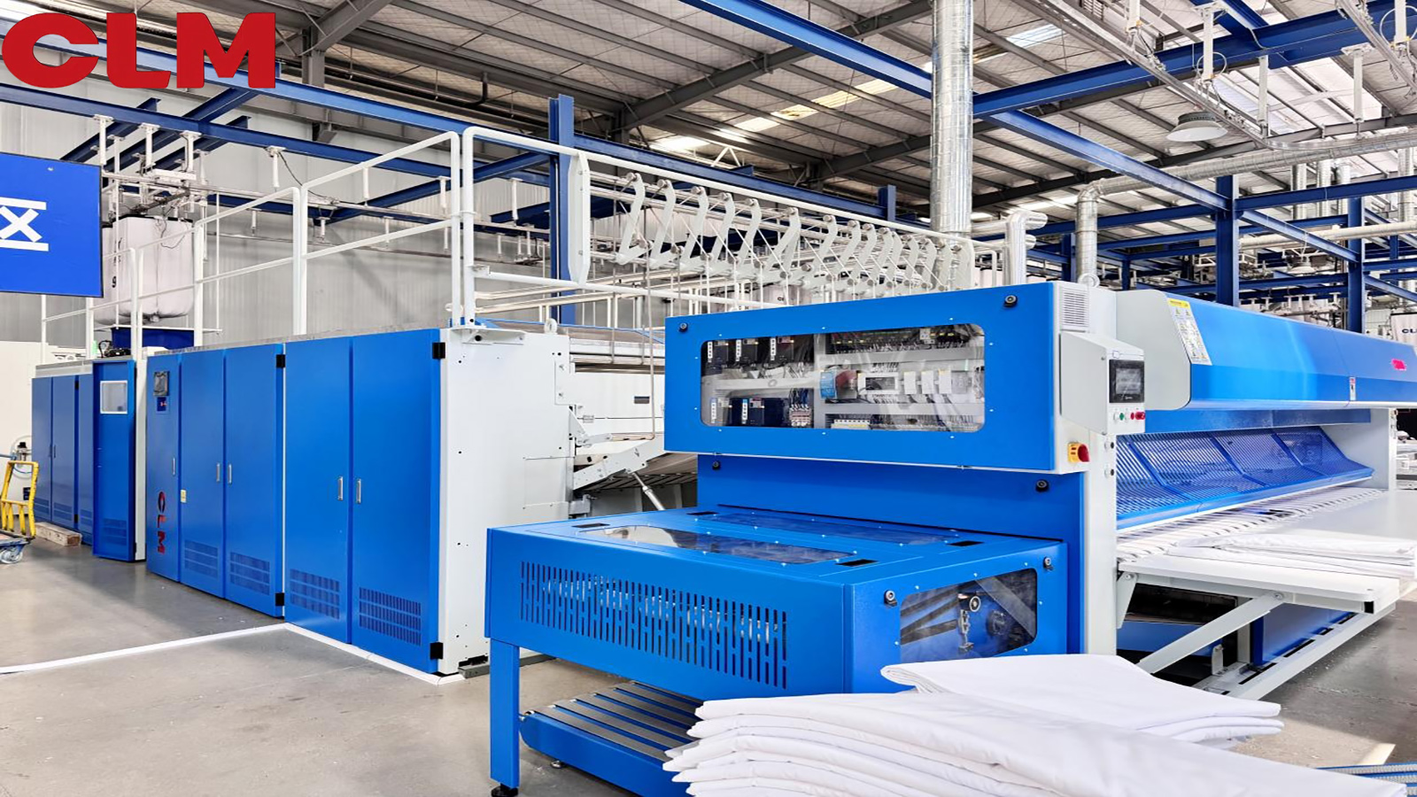 What Really Determines the Efficiency of a High-Speed Ironing Line in Industrial Laundry facility?