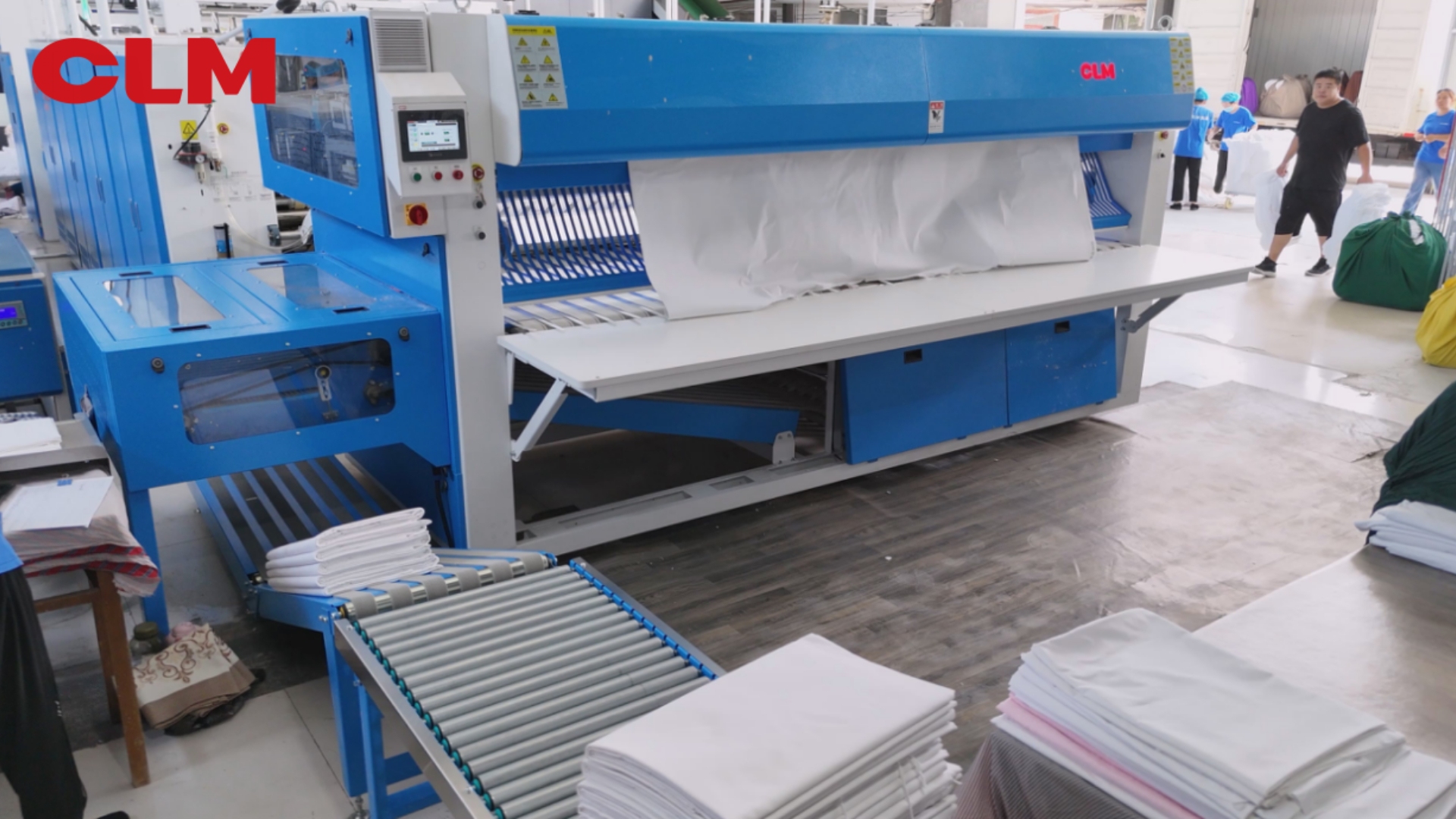 CLM Roller Ironing Line: Flatness that Rivals Chest Ironer